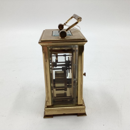 210 - A gilt brass carriage clock by Dent f London in original box