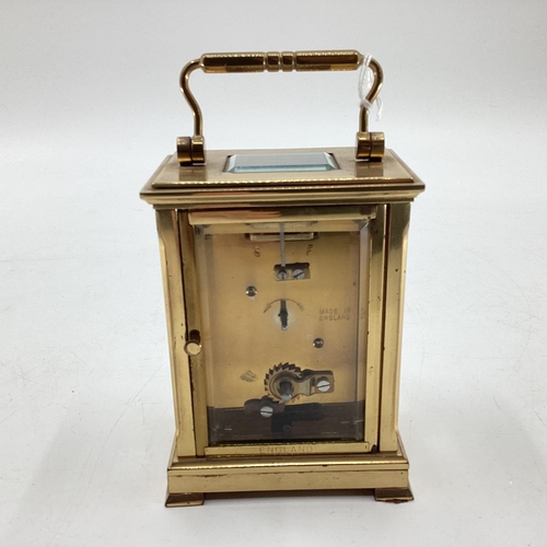 210 - A gilt brass carriage clock by Dent f London in original box