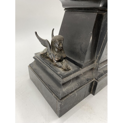 215 - A slate mantle clock,topped by mythical beast with sphinx 43cm W x 16cm D x 39cm H and two mantle cl... 