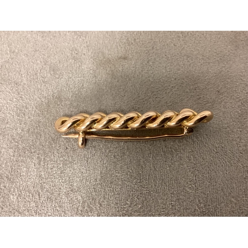 22 - A 15ct gold knot brooch 5.9g