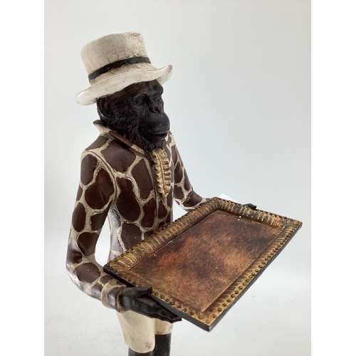 222 - A composite model of a Chimpanzee in hat and coat  and card trau 60cmH