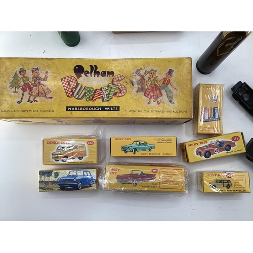 237 - A collection of seven boxed Dinky Toys together with a C20th toys to include Pelham Puppet