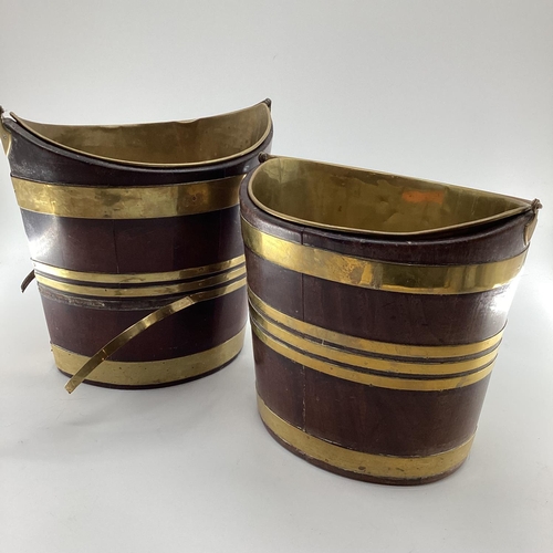 259 - Two late C19th oval mahogany brass bound peat buckets, with brass lined interiors and loop handles, ... 