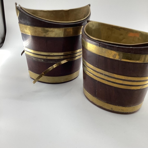 259 - Two late C19th oval mahogany brass bound peat buckets, with brass lined interiors and loop handles, ... 