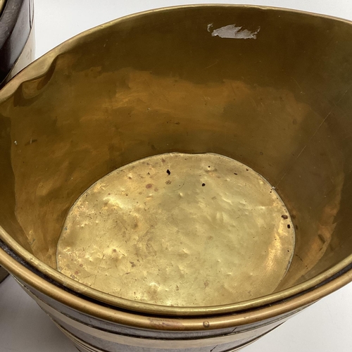 259 - Two late C19th oval mahogany brass bound peat buckets, with brass lined interiors and loop handles, ... 