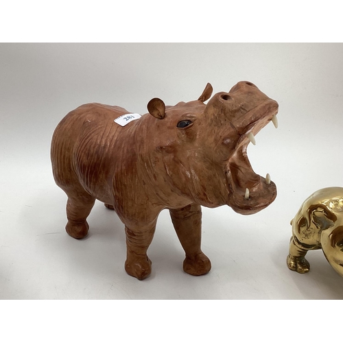 281 - A collection of model Hippos, glass, metal, wood, and a Limoges lidded box with hippo, all as found,... 