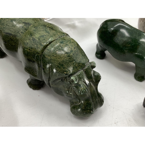 281 - A collection of model Hippos, glass, metal, wood, and a Limoges lidded box with hippo, all as found,... 