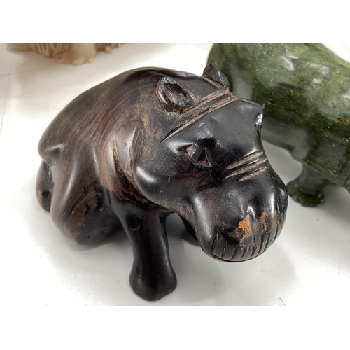 281 - A collection of model Hippos, glass, metal, wood, and a Limoges lidded box with hippo, all as found,... 