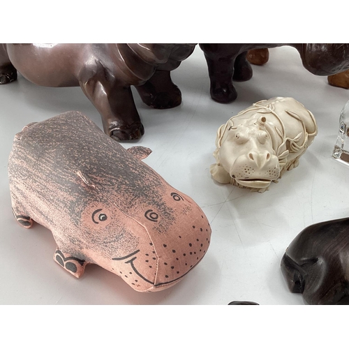 281 - A collection of model Hippos, glass, metal, wood, and a Limoges lidded box with hippo, all as found,... 