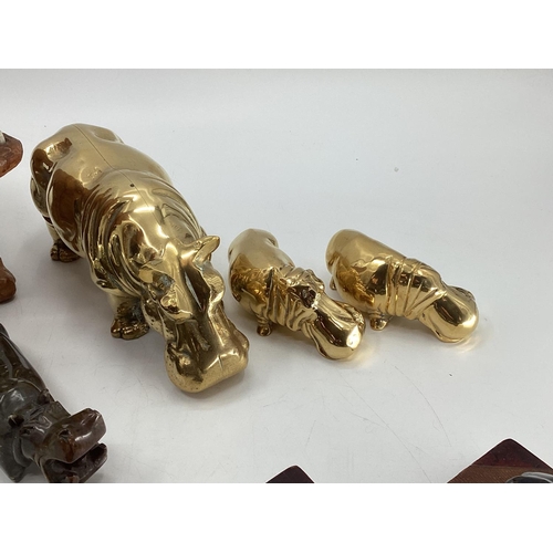 281 - A collection of model Hippos, glass, metal, wood, and a Limoges lidded box with hippo, all as found,... 