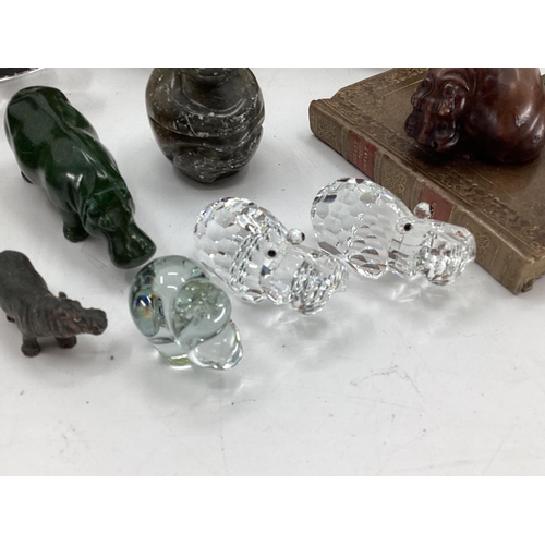 281 - A collection of model Hippos, glass, metal, wood, and a Limoges lidded box with hippo, all as found,... 