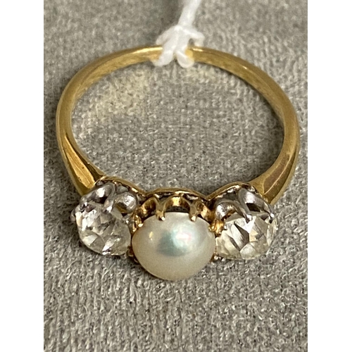 3 - An unmarked yellow and white metal pearl and diamond ring, central button pearl with old cut diamond... 