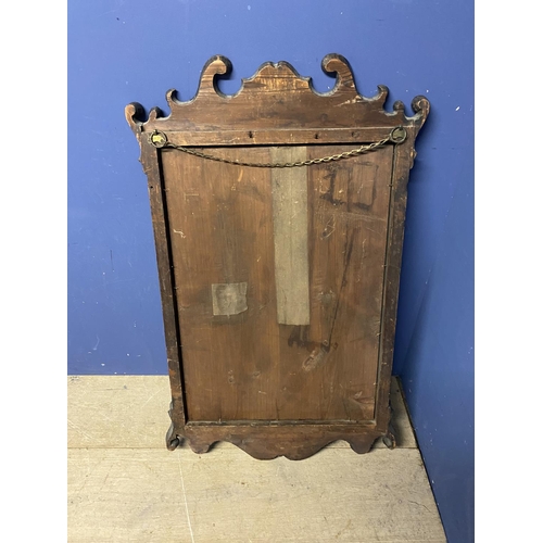 306 - a wooden and gilt framed wall mirror, 100 x 55