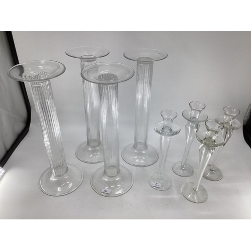 320 - A quantity of decorative glass candlesticks