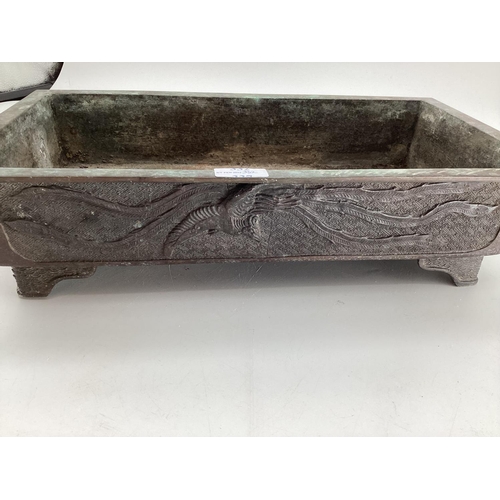 332 - A rectangular Chinese style bronzed footed dish, some wear and losses, and marks to base