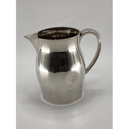 41 - A Sterling silver marked water jug by C D Peacock, USA, 18.5cmH approx 640g