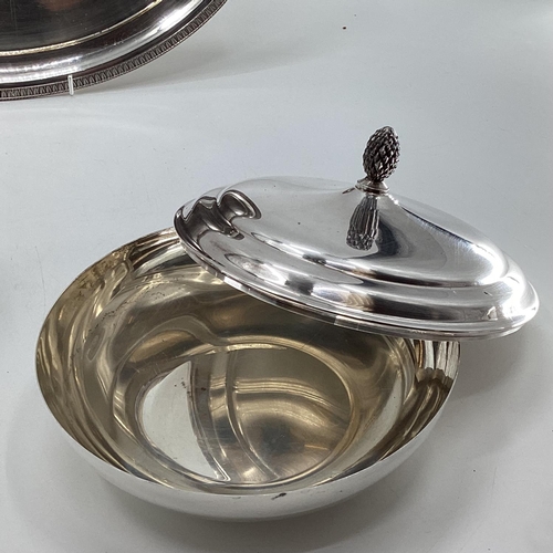 42 - A collection of silver plated and white metal table ware