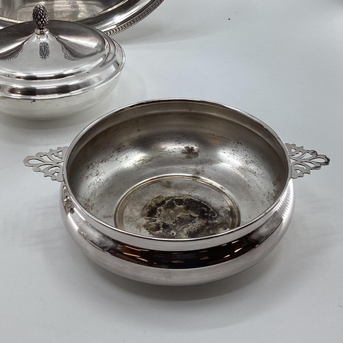 42 - A collection of silver plated and white metal table ware