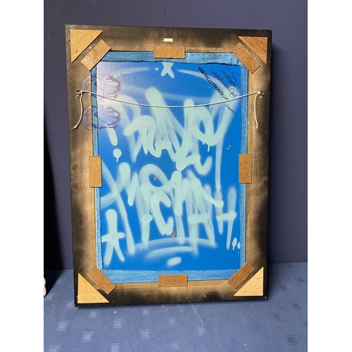 427 - Two decorative modern punk/street art pictures, framed, and painted verso, Titled  verso 