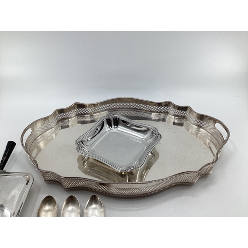 43 - A large collection of silver plated wares to include a pierced galleried tray