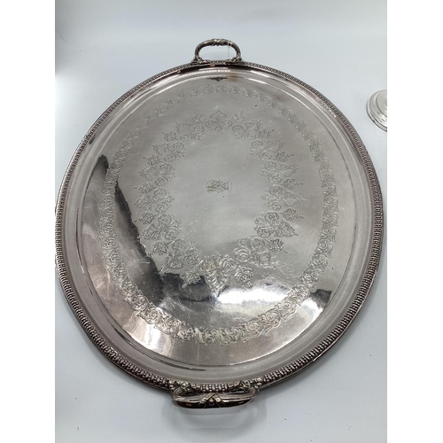 44 - A large collection of silver plated and white metal items to include a large oval tray with loop han... 