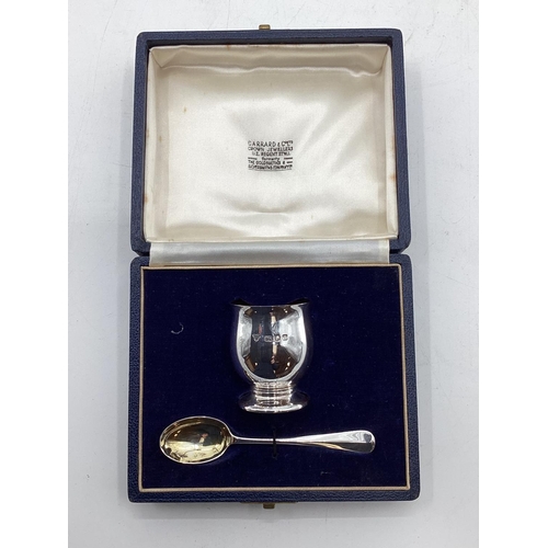 45 - A collection of sterling silver items to include toast rack, sauce boat, and other items