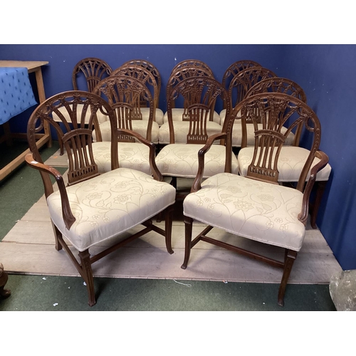 467 - A good set of 12 (10+2 carvers) Chippendale style dining chairs with cream upholstery, 95cmH