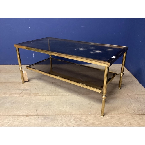 477 - A Brass and glass  two tier coffee table 90.5cm W x 46cm D x 41cm H (  a little bit wobbly, but no b... 