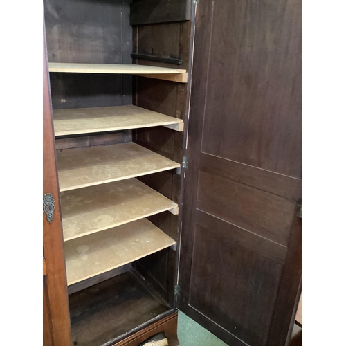 488 - A mahogany and string inlay decoration, two door linen press with added shelves built in to interior... 