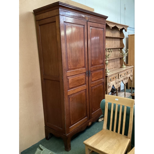 488 - A mahogany and string inlay decoration, two door linen press with added shelves built in to interior... 