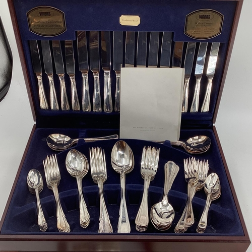 52 - A boxed canteen of electro plated cutlery together with a boxed plated fish server