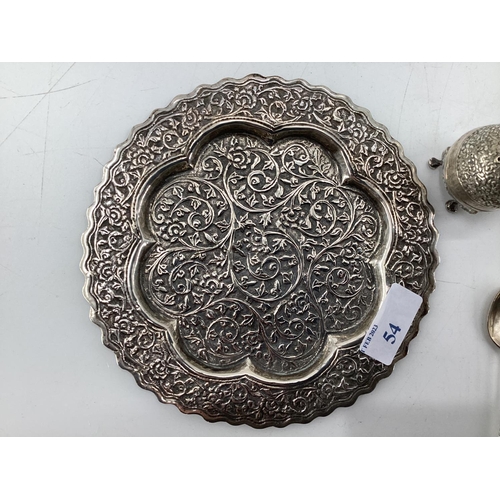 54 - A South Asian white metal condiment set and tray together with other similar items