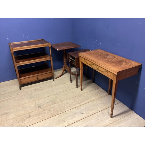 542 - Small mahogany two tier buffet with drawer below, on wheels, and a fold over table, a fall flap occa... 