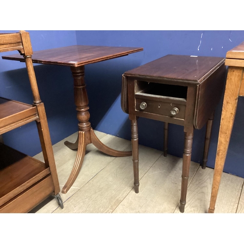 542 - Small mahogany two tier buffet with drawer below, on wheels, and a fold over table, a fall flap occa... 