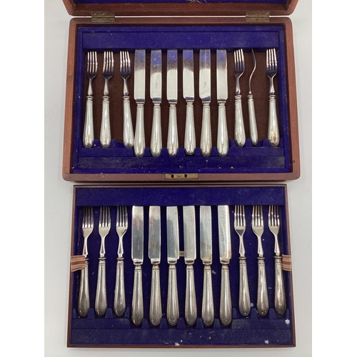 55 - A boxed canteen of white metal cutlery