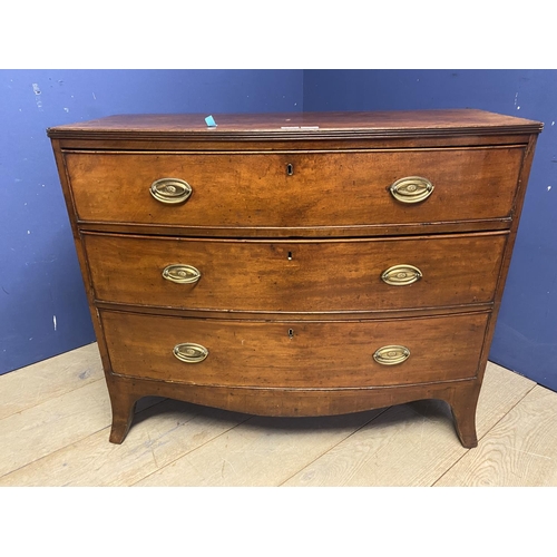 559 - Victorian mahogany bow front chest of three long drawers, 103cm W, some wear and losses