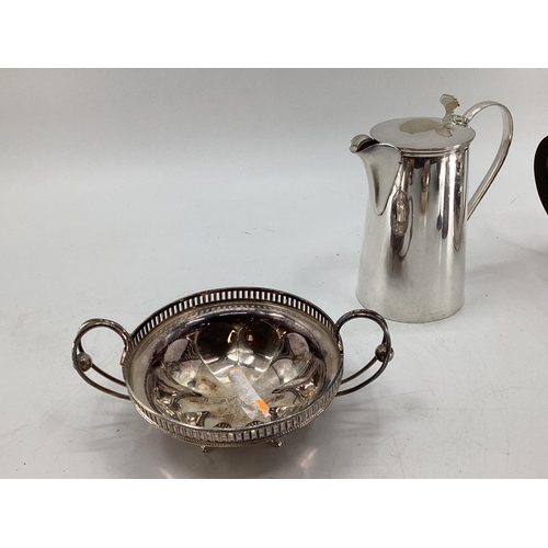 56 - A collection of electroplated wares, to include tea pots, jugs etc