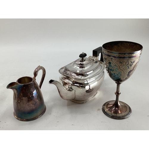 56 - A collection of electroplated wares, to include tea pots, jugs etc