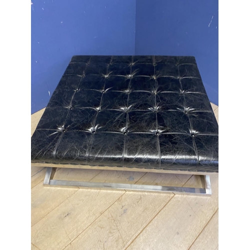 568 - A contemporary chrome and leather large foot stool, buttoned leather to top, 120cm x 120cm x 44cm Hi... 