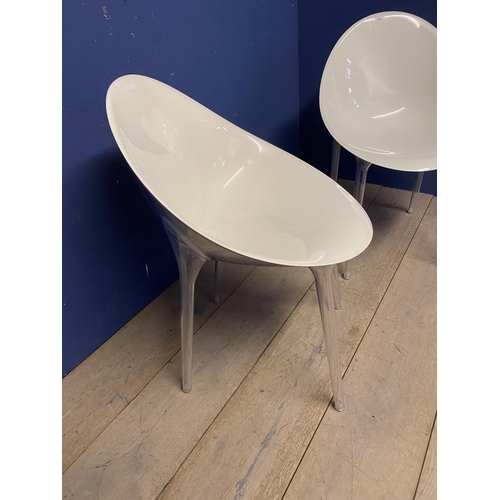 579 - Pair of modern designer style , white and transparent plastic tub chairs, stamped Kartell to plastic... 