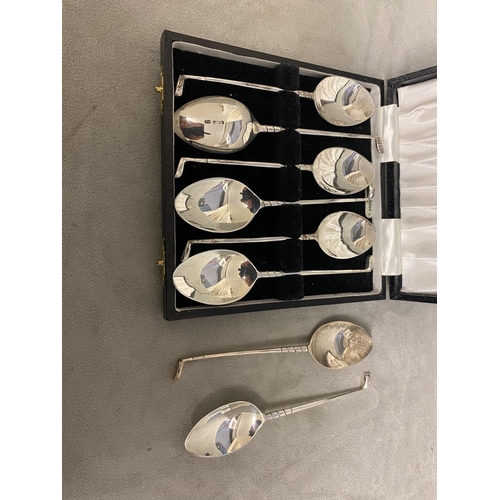 58 - A set of Sterling silver 8 teaspoons with golf club finials boxed by Edward Viner, Sheffield