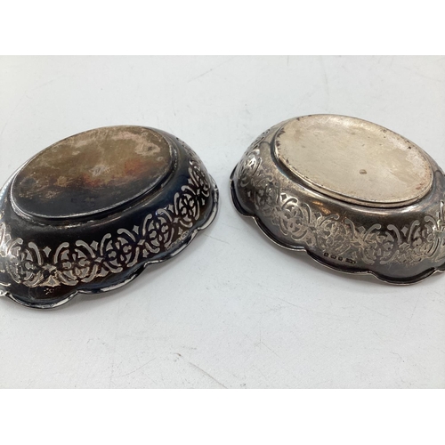 71 - Pair of sterling silver oval pierced dishes and salts and a white metal trinket box