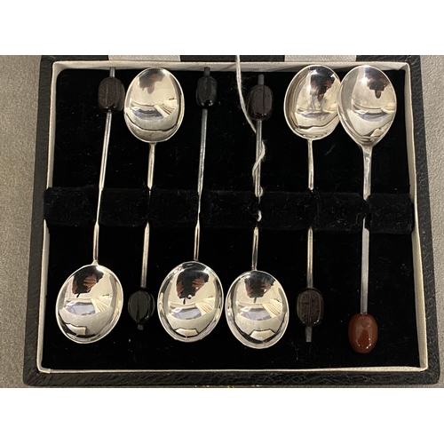 9 - A boxed set of Sterling Silver coffee spoons with bean finials