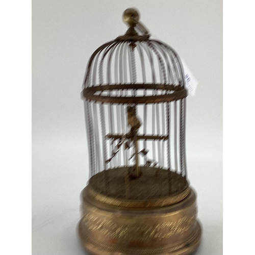 95 - A Continental early C20th bird case Automaton, Clockwork mechanism, with gilt brass base, 28cmH