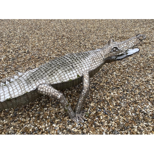 346 - CLARE TUPMAN, British, Large sculpture of a crocodile, 250cm L. Notes: Clare Tupman, mother of 4, at... 