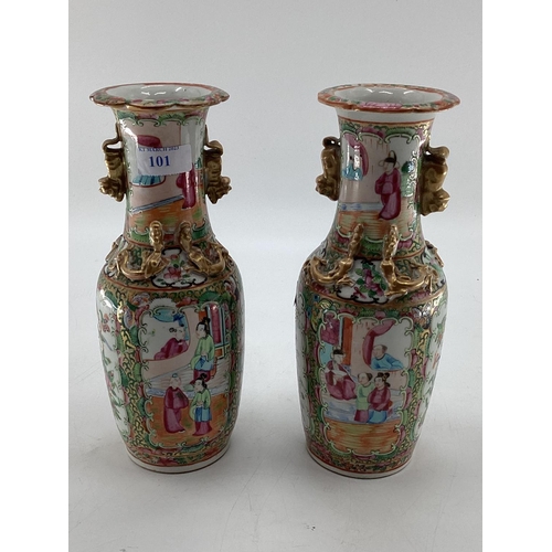 101 - A pair of small late C19th/early C20th Chinese Famille Rose Baluster vases, gilt decoration with han... 