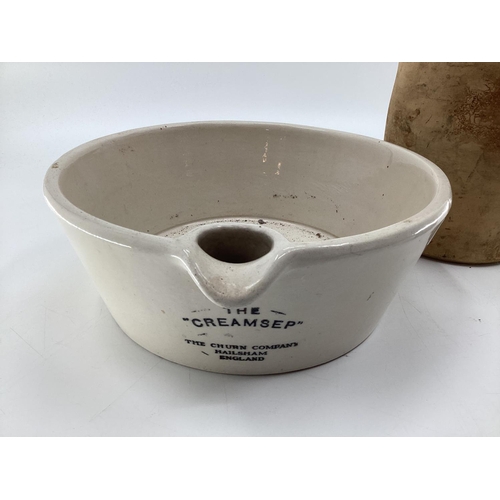 102 - Two stoneware items, flask marked Russells and Wrangham Ltd, Malton and The Cream Sep, and a blue an... 