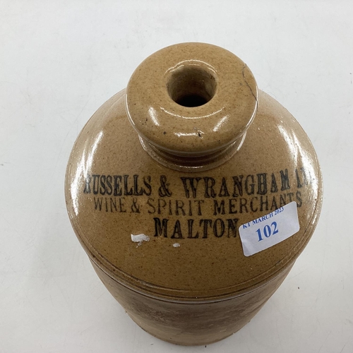 102 - Two stoneware items, flask marked Russells and Wrangham Ltd, Malton and The Cream Sep, and a blue an... 