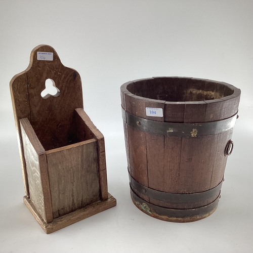 104 - An oak candle box with trefoil cut out, 40cmH, and a brass bound copered bucket 28cmH