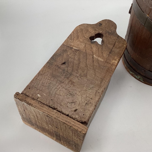 104 - An oak candle box with trefoil cut out, 40cmH, and a brass bound copered bucket 28cmH